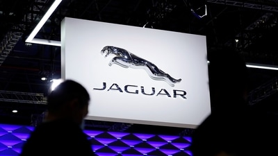 The Jaguar logo is seen at the Jaguar Land Rover booth during a media day for the Auto Shanghai show in Shanghai, China. (REUTERS)