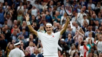 Switzerland's Roger Federer celebrates winning his fourth-round match against Italy's Lorenzo Sonego (REUTERS)