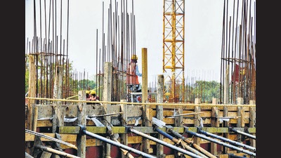 Workers at Construction site at Narhe in Pune. (HT PHOTO) Workers at Construction site at Narhe in Pune. (HT PHOTO)