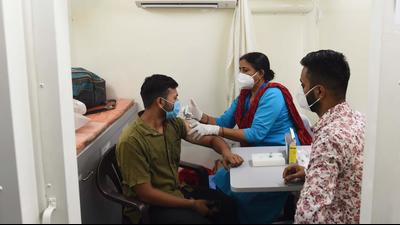 A health worker administers a dose of Covid-19 vaccine at Indira Colony, Sector 42, in Gurugram on Monday, July 5. (Vipin Kumar/HT photo) A health worker administers a dose of Covid-19 vaccine at Indira Colony, Sector 42, in Gurugram on Monday, July 5. (Vipin Kumar/HT photo)