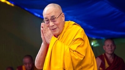 Tibetan spiritual leader the Dalai Lama greets devotees in Dharmsala. (AP) Tibetan spiritual leader the Dalai Lama greets devotees in Dharmsala. (AP)