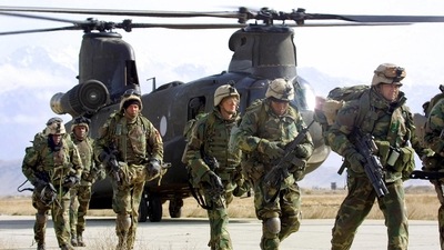 In this file photo taken on March 11, 2002 US soldiers returning from the Gardez battlefield leave a Chinook helicopter at the US base in Bagram. (AFP) In this file photo taken on March 11, 2002 US soldiers returning from the Gardez battlefield leave a Chinook helicopter at the US base in Bagram. (AFP)