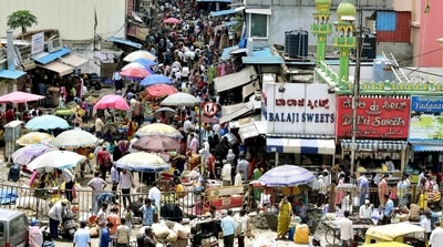 Karnataka lifted clamped on markets and were seen brimming with people. (ANI Photo) Karnataka lifted clamped on markets and were seen brimming with people. (ANI Photo)
