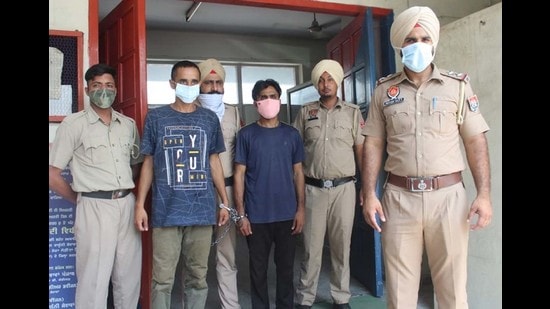 Two of the accused in police custody in Khanna.