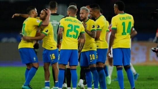 Brazil's teammates celebrate their team's 1-0 victory over Peru during Copa America semifinal(AP)