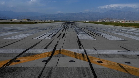 General view of the runway tarmac inside the Bagram air base after all US and NATO troops left, on July 5. “It is not a problem for us if there are foreign forces (here) or they leave, but the fact that the Taliban are taking over districts at any moment affects our work,” Wasim Shirzad, a shopkeeper told Reuters.(Wakil Kohsar / AFP)