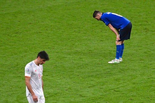 Italy's Jorginho and Spain's Gerard, left, react at the end of extra time during the Euro 2020 soccer championship semifinal match between Italy and Spain at Wembley stadium in London, Tuesday, July 6, 2021. (Facundo Arrizabalaga/Pool Photo via AP) Italy's Jorginho and Spain's Gerard, left, react at the end of extra time during the Euro 2020 soccer championship semifinal match between Italy and Spain at Wembley stadium in London, Tuesday, July 6, 2021. (Facundo Arrizabalaga/Pool Photo via AP)