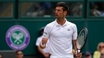 Wimbledon: Novak Djokovic cruises into semifinals, beats Marton Fucsovics in straight sets.(AP) Wimbledon: Novak Djokovic cruises into semifinals, beats Marton Fucsovics in straight sets.(AP)