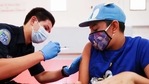 A student getting the Covid-19 vaccine in California on Tuesday.(AFP Photo) A student getting the Covid-19 vaccine in California on Tuesday.(AFP Photo)