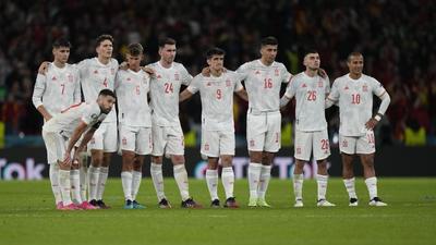 Spain players react during the penalty shootout against Italy at Wembley stadium in London on Tuesday. (AP) Spain players react during the penalty shootout against Italy at Wembley stadium in London on Tuesday. (AP)