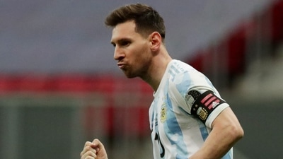 Argentina's Lionel Messi celebrates after scoring a penalty during the Copa America semi-final shootout against Colombia (REUTERS)