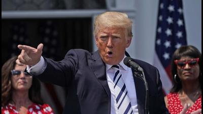 Former president Donald Trump imitates the shooting of a gun with his finger while talking about gun violence in Chicago as he speaks at Trump National Golf Club in Bedminster, New Jersey, on Wednesday. (AP) Former president Donald Trump imitates the shooting of a gun with his finger while talking about gun violence in Chicago as he speaks at Trump National Golf Club in Bedminster, New Jersey, on Wednesday. (AP)