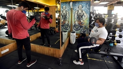 Men exercising in a gym in New Delhi on July 28 after relaxations to Covid-19 curbs allowed for their reopening. “Delta variant was so infectious that a high proportion of people in Delhi have been exposed, protecting them from infection for 6-10 months. We’re also increasing vaccination; more people will get immunity,” said Dr Puneet Mishra, professor of community medicine at AIIMS. (Sanjeev Verma / HT Photo) Men exercising in a gym in New Delhi on July 28 after relaxations to Covid-19 curbs allowed for their reopening. “Delta variant was so infectious that a high proportion of people in Delhi have been exposed, protecting them from infection for 6-10 months. We’re also increasing vaccination; more people will get immunity,” said Dr Puneet Mishra, professor of community medicine at AIIMS. (Sanjeev Verma / HT Photo)