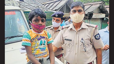 Amit with the McLeodganj police on Wednesday. (HT Photo)