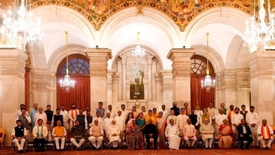 President Ram Nath Kovind, First Lady Savita Kovind, Vice President M Venkaiah Naidu, Prime Minister Narendra Modi and Lok Sabha Speaker Om Birla in a group photograph with the newly sworn-in Council of Ministers at the Rashtrapati Bhavan. (PTI) President Ram Nath Kovind, First Lady Savita Kovind, Vice President M Venkaiah Naidu, Prime Minister Narendra Modi and Lok Sabha Speaker Om Birla in a group photograph with the newly sworn-in Council of Ministers at the Rashtrapati Bhavan. (PTI)