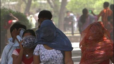 People cover their face on a very hot and windy day in the Capital. (Representational image/HT Archive)