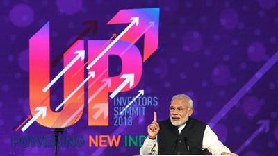 Prime Minister Narendra Modi had floated the idea of making the state a trillion-dollar economy at the Uttar Pradesh Investors’ Summit 2018 in Lucknow on February 21, 2018. (PTI FILE PHOTO) Prime Minister Narendra Modi had floated the idea of making the state a trillion-dollar economy at the Uttar Pradesh Investors’ Summit 2018 in Lucknow on February 21, 2018. (PTI FILE PHOTO)