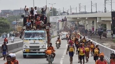 Kanwariyas carry water from the Ganga River during the Kanwar Yatra. (Sanjeev Verma/ HT File Photo)