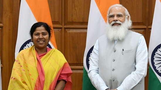 Pratima Bhoumik with Prime Minister Narendra Modi before the oath ceremony at 7, Lok Kalyan Marg, in New Delhi on July 07, 2021. (HT Photo)