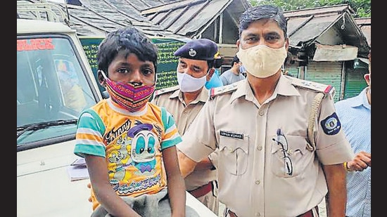 Amit with the McLeodganj police on Wednesday. (HT Photo) Amit with the McLeodganj police on Wednesday. (HT Photo)