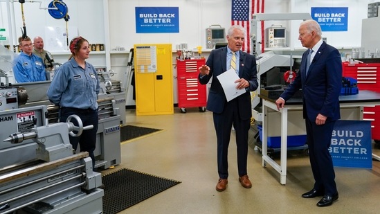 President of McHenry County College Clint Gabbard speaks as President Joe Biden tours a manufacturing lab at the college on Wednesday. (AP)