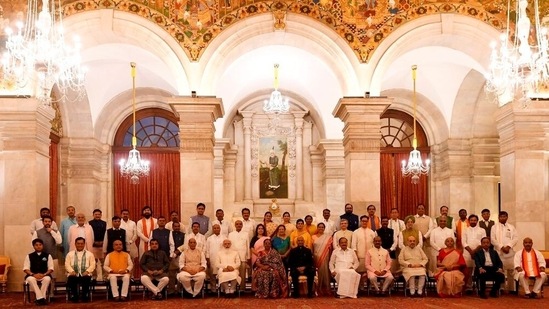 President Ram Nath Kovind, First Lady Savita Kovind, Vice President M Venkaiah Naidu, Prime Minister Narendra Modi and Lok Sabha Speaker Om Birla in a group photograph with the newly sworn-in Council of Ministers at the Rashtrapati Bhavan.(PTI) President Ram Nath Kovind, First Lady Savita Kovind, Vice President M Venkaiah Naidu, Prime Minister Narendra Modi and Lok Sabha Speaker Om Birla in a group photograph with the newly sworn-in Council of Ministers at the Rashtrapati Bhavan.(PTI)