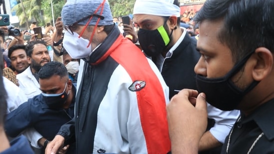 Amitabh Bachchan and Abhishek Bachchan at Dilip Kumar's funeral. Amitabh Bachchan and Abhishek Bachchan at Dilip Kumar's funeral.