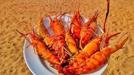 Cheap and delicious seafood: The mouth-watering fresh out of the boat seafood available all around the year is another reason to visit Sri Lanka. From crabs and jumbo prawns to squid and cuttlefish, you will definitely return with a satisfied tummy.(Unsplash)