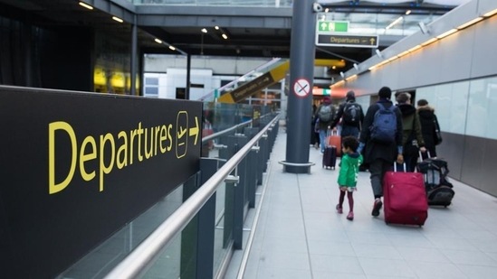 Fully vaccinated travellers arriving from Britain's "amber list" are set to avoid quarantine from July 19.(Chris Ratcliffe/Bloomberg)