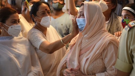 Saira Banu consoled by friends at the funeral of her husband Dilip Kumar.