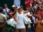 Wimbledon - All England Lawn Tennis and Croquet Club, London, Britain - July 8, 2021 Australia's Ashleigh Barty waves after winning her semi final match against Germany's Angelique Kerber