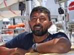 Abhilash Tomy poses on his boat Thuriya ahead of the solo around-the-world sailing race for the Golden Globe Race in 2018. (File photo) Abhilash Tomy poses on his boat Thuriya ahead of the solo around-the-world sailing race for the Golden Globe Race in 2018. (File photo)