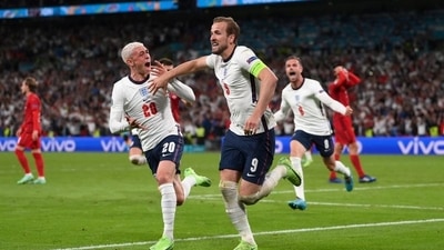 England's Harry Kane celebrates scoring their second goal with Phil Foden (Pool via REUTERS)