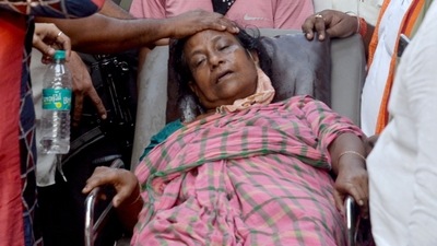 Mother of a BJP worker being stretchered off for medical assistance following the death of her son seen in this file photo fro,m May 2021. A NHRC team is currently investigation allegations of post-poll violence in Bengal. (ANI) Mother of a BJP worker being stretchered off for medical assistance following the death of her son seen in this file photo fro,m May 2021. A NHRC team is currently investigation allegations of post-poll violence in Bengal. (ANI)