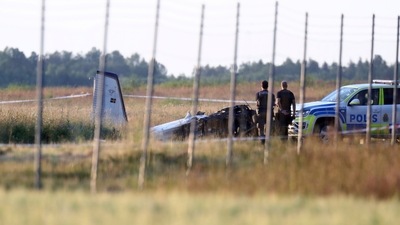 Emergency services at the scene of small aircraft crash, at Orebro Airport in Sweden, Thursday, July 8 2021. (AP)