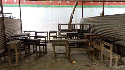 “Holding classes under tin roofs is not an easy task. Be it the excruciating heat of summers or incessant monsoon downpour, there are multiple challenges that students face.” says the school in-charge. (Sadia Akhtar/HT Photo) “Holding classes under tin roofs is not an easy task. Be it the excruciating heat of summers or incessant monsoon downpour, there are multiple challenges that students face.” says the school in-charge. (Sadia Akhtar/HT Photo)