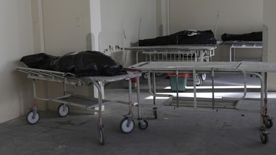 Bodies of people who died of symptoms related to Covid-19 lie at Honorio Delgado Hospital in Arequipa, Peru on June 24. In recent weeks, the mutant delta version of the virus first identified in India has set off alarms around the world, spreading rapidly even in vaccination success stories like the US, Britain and Israel. (Guadalupe Pardo / AP)