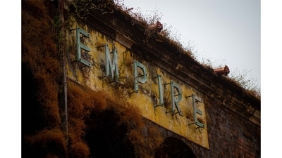 The overgrown sign for the abandoned Empire Theatre in Jabalpur, Madhya Pradesh. Chaturvedi has photographed over 650 single-screen cinemas across 500 towns so far. (Photo by Hemant Chaturvedi)