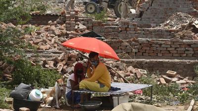 Residents said that lack of water and electricity are causing problems amid the scorching heat. (Parveen Kumar/HT Photo) Residents said that lack of water and electricity are causing problems amid the scorching heat. (Parveen Kumar/HT Photo)