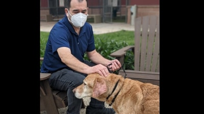 The image shows Samson reunited with his owner after 10 years. (Facebook/@City of San Antonio Animal Care Services) The image shows Samson reunited with his owner after 10 years. (Facebook/@City of San Antonio Animal Care Services)