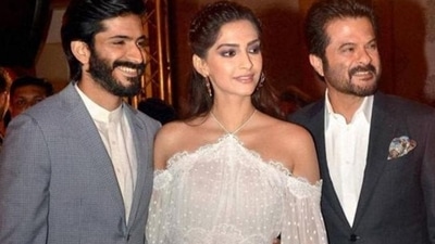 Harsh Varrdhan Kapoor poses with sister Sonam Kapoor and father Anil Kapoor.