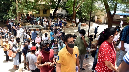 Indian students studying in foreign universities stand in queues to get the vaccination at a special drive.(ANI)