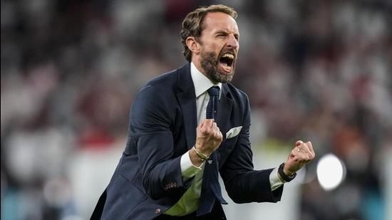 England manager Gareth Southgate celebrates after winning the Euro 2020 semi-final against Denmark at Wembley in London on Wednesday. (AP)