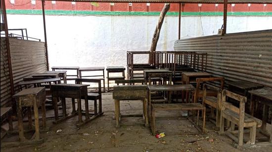 “Holding classes under tin roofs is not an easy task. Be it the excruciating heat of summers or incessant monsoon downpour, there are multiple challenges that students face.” says the school in-charge. (Sadia Akhtar/HT Photo) “Holding classes under tin roofs is not an easy task. Be it the excruciating heat of summers or incessant monsoon downpour, there are multiple challenges that students face.” says the school in-charge. (Sadia Akhtar/HT Photo)