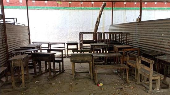 “Holding classes under tin roofs is not an easy task. Be it the excruciating heat of summers or incessant monsoon downpour, there are multiple challenges that students face.” says the school in-charge. (Sadia Akhtar/HT Photo)