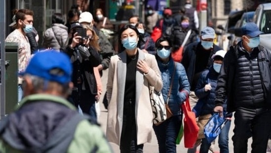 People walk the streets of New York, in the United States, as concerns peak over the spread of the Delta variant of Covid-19 in the country.(File Photo)
