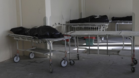 Bodies of people who died of symptoms related to Covid-19 lie at Honorio Delgado Hospital in Arequipa, Peru on June 24. In recent weeks, the mutant delta version of the virus first identified in India has set off alarms around the world, spreading rapidly even in vaccination success stories like the US, Britain and Israel.(Guadalupe Pardo / AP)