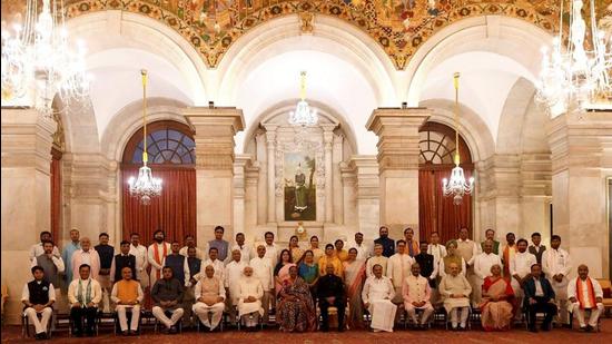 President Ram Nath Kovind, First Lady Savita Kovind, ice President M Venkaiah Naidu, Prime Minister Narendra Modi and Lok Sabha Speaker Om Birla in a group photograph with the newly sworn-in Council of Ministers, at the Rashtrapati Bhavan, in New Delhi, Wednesday, July 7, 2021. (PTI)