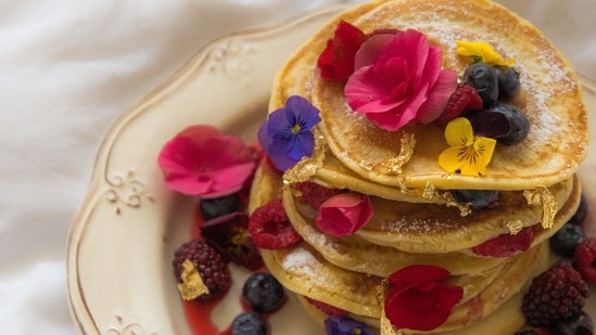 Many flowers can be used in different styles of cuisines. You can add it to salads, sauces, beverages to enhance the taste. But you need to know which ones to consume since not all are safe to eat. Here are a few edible flowers with potential health benefits.(Unsplash)