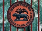 A Reserve Bank of India (RBI) logo is seen at the gate of its office in New Delhi.